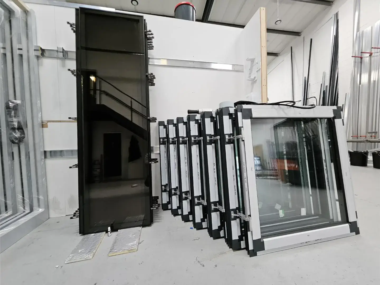 Finished aluminium doors and frames ready for dispatch from the Warrington workshop