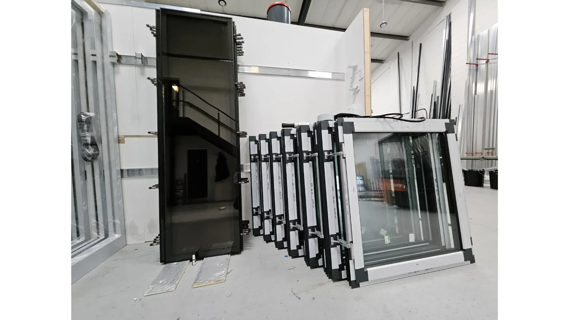 Finished windows and doors labelled and staged for dispatch